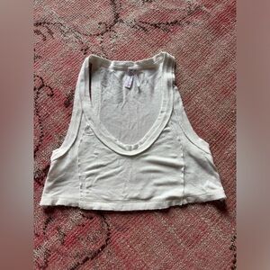 Urban Outfitters out from under tank top